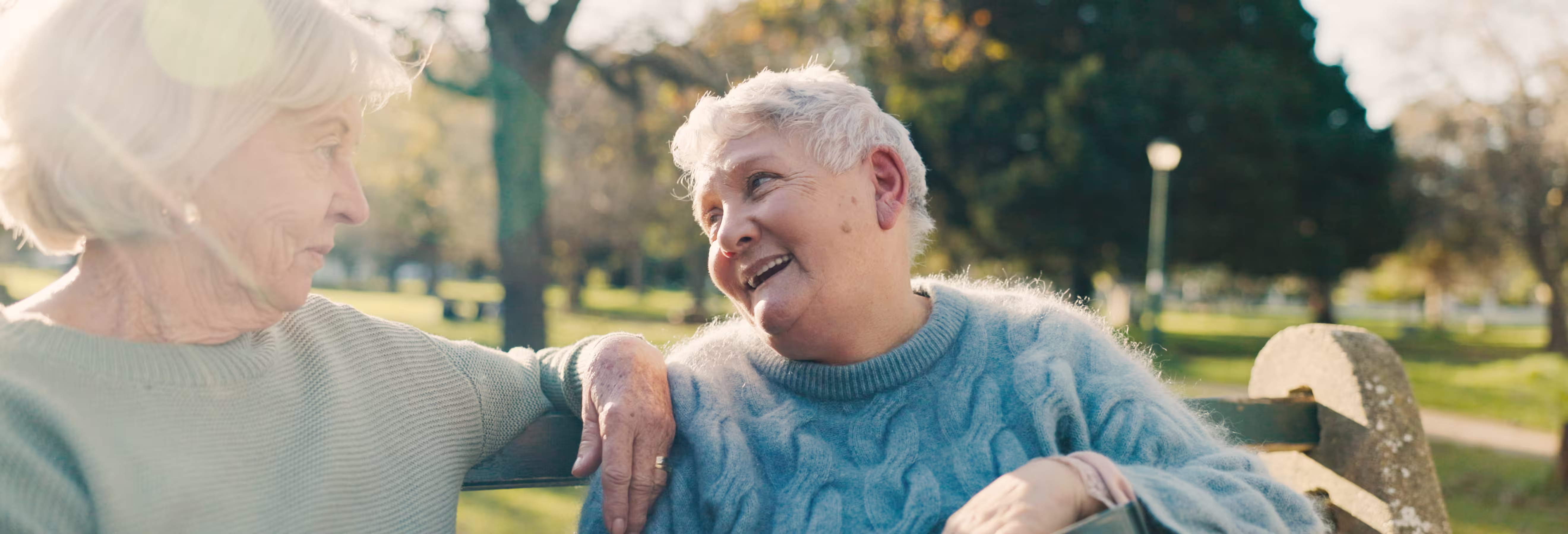 Senior care professional helping resident feel comfortable